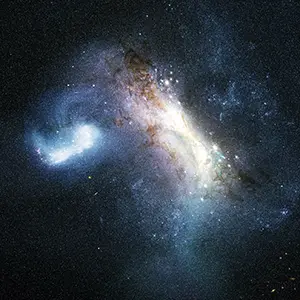 About 12 billion years ago, a dwarf galaxy known as LKH collided with a young Milky Way and merged with it. This artist’s concept portrays that collision. NASA, ESA, Joseph Olmsted (STScI)