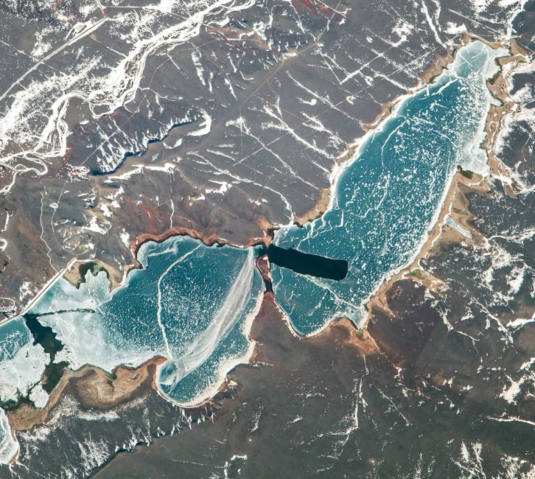 Icecovered Wheatland Reservoir in Wyoming •