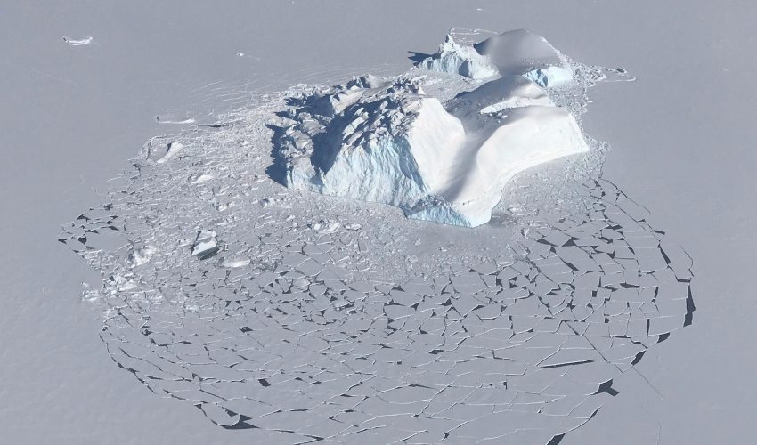 Today’s Image of the Day comes from the NASA Earth Observatory and features a look at an iceberg that started as land ice and flowed downstream until it became suspended in frozen seawater.