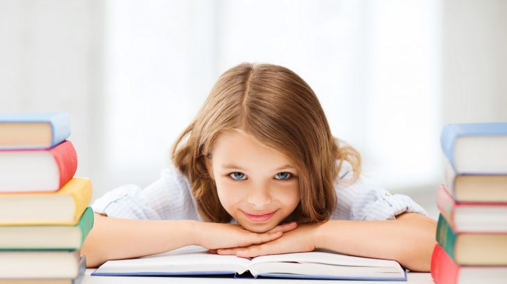New research suggests that, by as early as fourth grade, girls perform better than boys on standardized reading and writing tests.