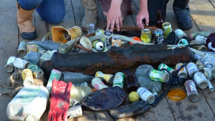 Researchers have discovered that a Royal Navy vessel which sank to the seafloor during the 18th century is now covered in marine pollution.