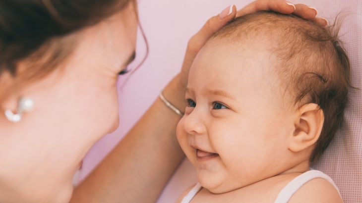 Smiling newborns aren't just passing gas. Babies as young as three weeks are most likely smiling back at their parents, new research shows.