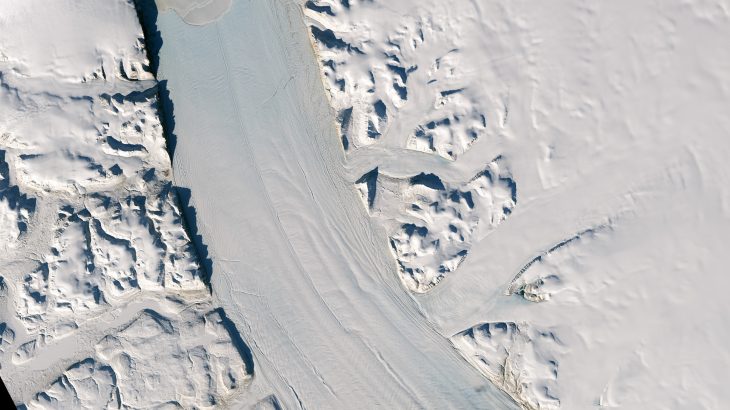 Miles of cracks along the Petermann Glacier suggest that soon an iceberg could calve from the glacier and float out to sea.