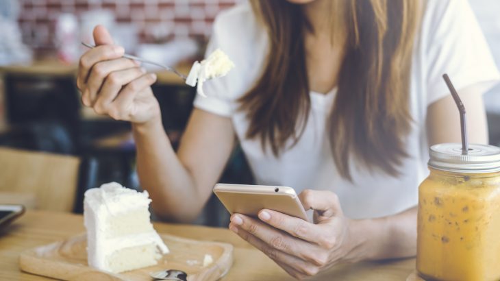 Smartphones can be used to track calorie intake and cumulative exercise, but could they also be working against your dietary goals?