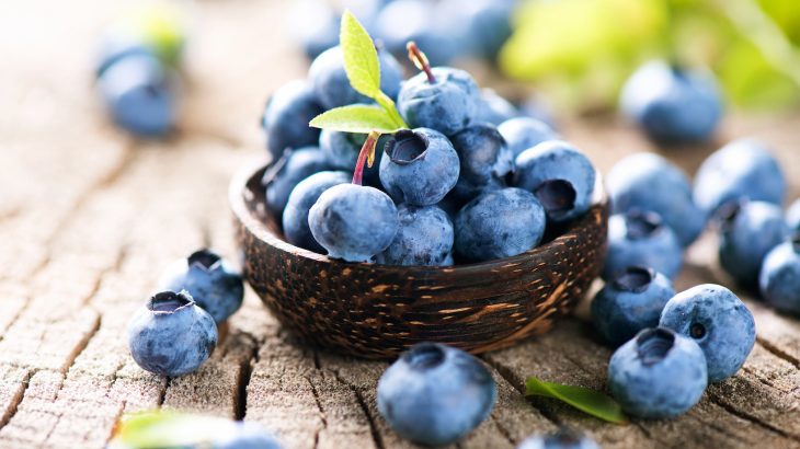 A new study suggests that surrounding blueberry plants with grass helps them absorb more iron and increases their antioxidant content.