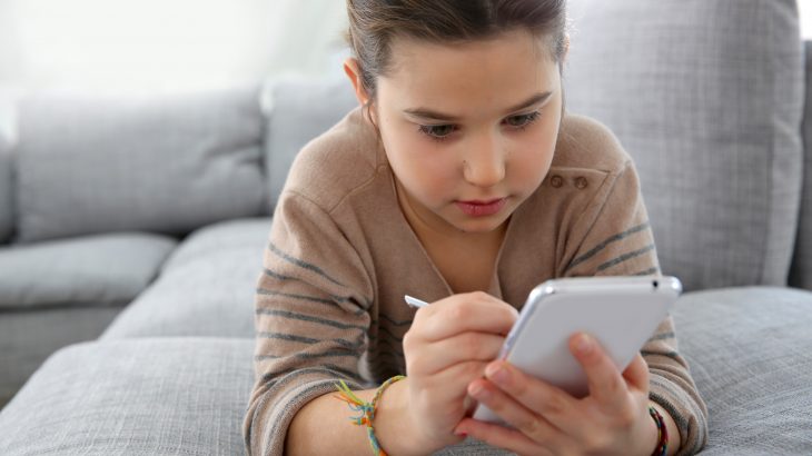 Kids are spending more time at home, but a new study shows that this extra time is being spent alone on smartphones.