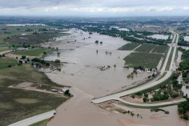 Community damage caused by extreme weather events, such as the 2013 floods that covered parts of Colorado, may shape climate beliefs more strongly than individual storm losses, a new study finds.