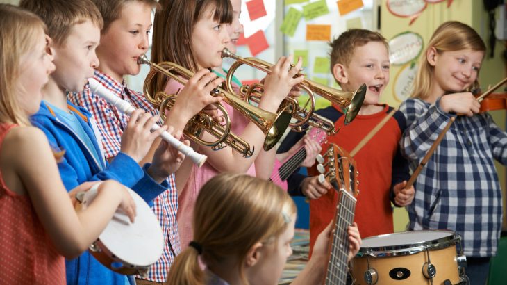 A new study has found that music students score higher on math and science exams compared to non-musical students.