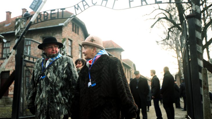 Holocaust survivors visit the site of the Auschwitz concentration camp in Poland in January 2015. A new study has found evidence of permanent changes to the brain in Holocaust survivors, which may have been passed on to their children and grandchildren. (Image credit: Praszkiewicz / Shutterstock.com)