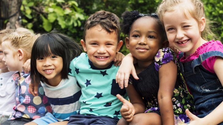 Kindergarten curriculums which involve more play, hands-on learning, and student cooperation are the most beneficial.