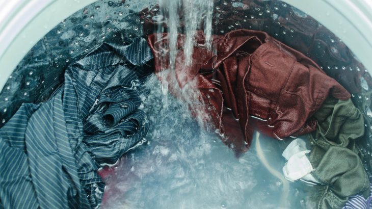 The amount of water used during the wash cycle is the main factor that influences the release of microfibers from clothing.