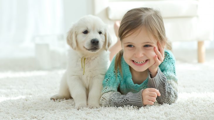 In a new study published by Springer, researchers have found that children from households with pet dogs have improved social and emotional well-being compared to kids without a dog at home.