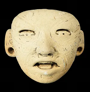 Head of the male figurine with tattoos or scarification. Width 55mm. Credit: J. Przedwojewska-Szymańska/PASI)