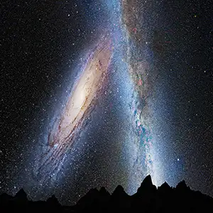 This artist's illustration shows a stage in the predicted merger between our Milky Way galaxy and the neighboring Andromeda galaxy, as it will unfold over the next several billion years. In this image, representing Earth's night sky in 3.75 billion years, Andromeda (left) fills the field of view and begins to distort the Milky Way with tidal pull. Credit: NASA; ESA; Z. Levay and R. van der Marel, STScI; T. Hallas; and A. Mellinger