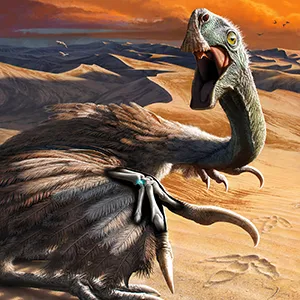 This is an illustration of an oviraptorid dinosaur called Citipati. The scene depicts Citipati being startled while resting on a sand dune. The creature raises its arms in a threat display, which reveals its wrists, highlighting the small migrated pisiform carpal (blue X-ray view) bone. Credit: Henry S. Sharpe