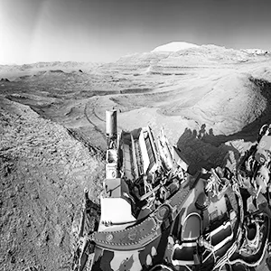 NASA's Curiosity Mars rover demonstrated a new multitasking capability when capturing this view: It snapped the 15 images that make up the mosaic while simultaneously communicating with an orbiter. The images were taken by the right navigation camera on Curiosity's mast July 26, 2025, the 4,611th sol, or day, of the mission. Credit: NASA/JPL