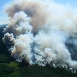Wildfire smoke delivers a 'double hit' to air quality