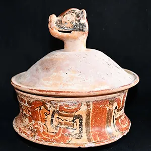 One of the pottery vessels features a handle resembling a coatimundi at Caracol. Credit: University of Houston