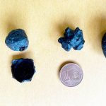 Pieces of 'cosmic glass' found only in Australia hint at a giant asteroid impact. Credit: Curtin University