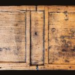 Among the mud and water, archaeologists found writing tablets, combs, and children's shoes intact