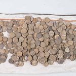 A treasure hunter accidentally discovers a hidden Roman treasure containing more than 450 silver coins and gold pieces