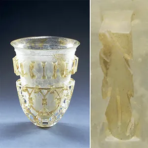 Glass openwork vessel excavated at Cologne dating to around 350–400 CE with an image of an inscription on the right. Inscription: BIBE MVLTIS ANNIS (Drink [may you live] for many years!) Credit: State Collection of Antiquities and Glyptothek, Munich. Photos by Christa Koppermann