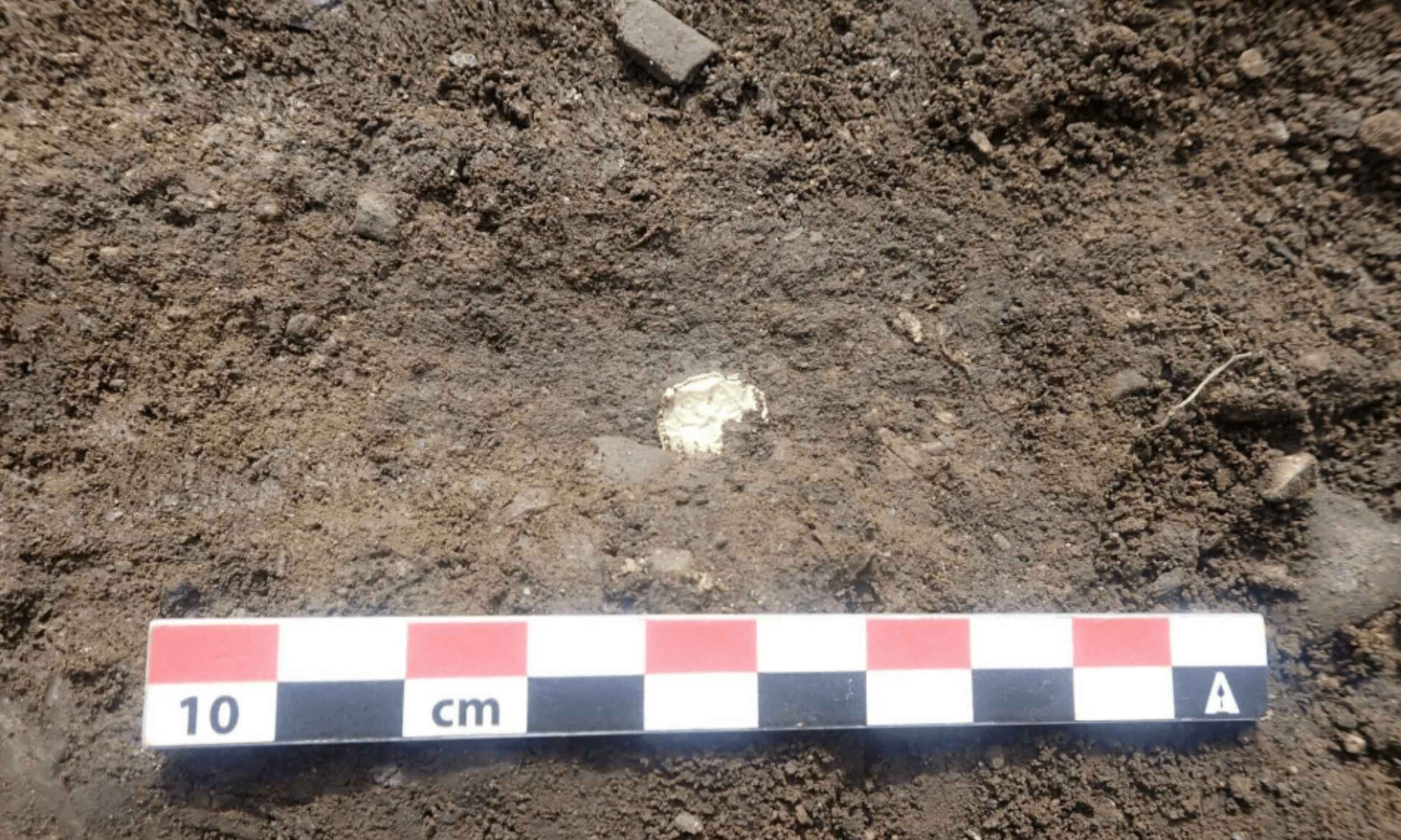 Construction crew discovers a pagan shrine filled with gold foil miniatures