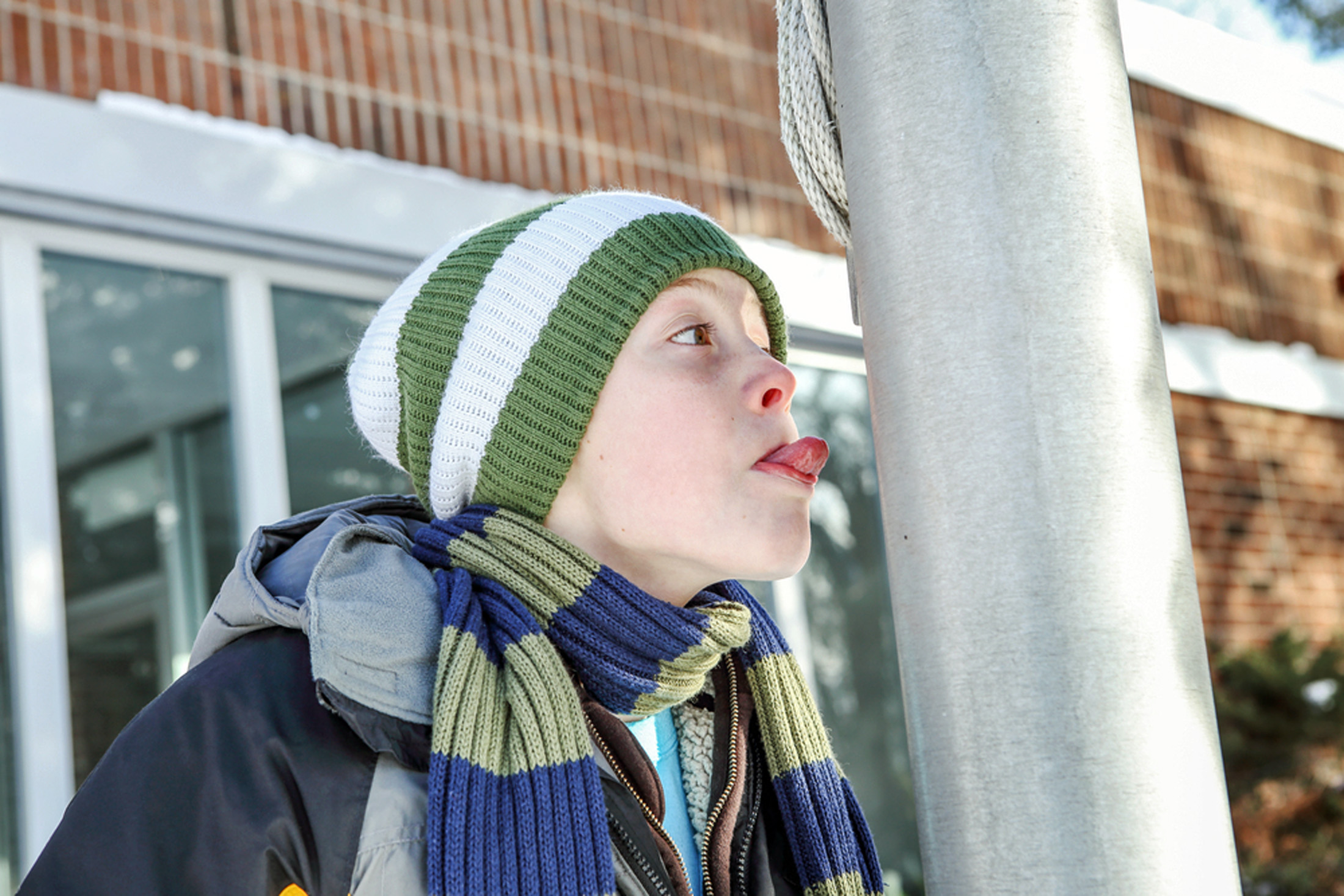 What happens when your tongue sticks to frozen metal? The risks are real