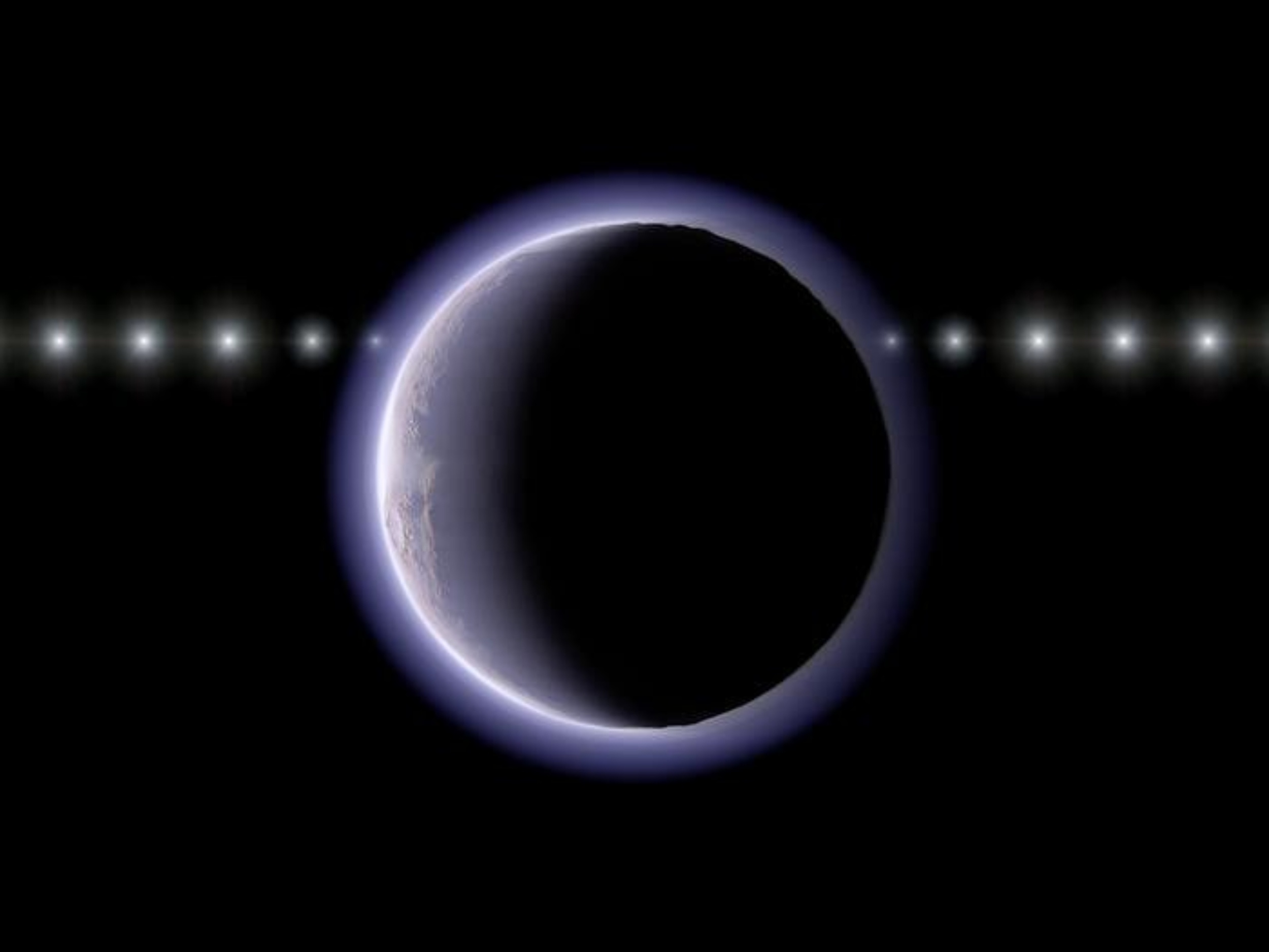 Tiny world beyond Pluto is wrapped in a mysterious atmosphere - Earth.com