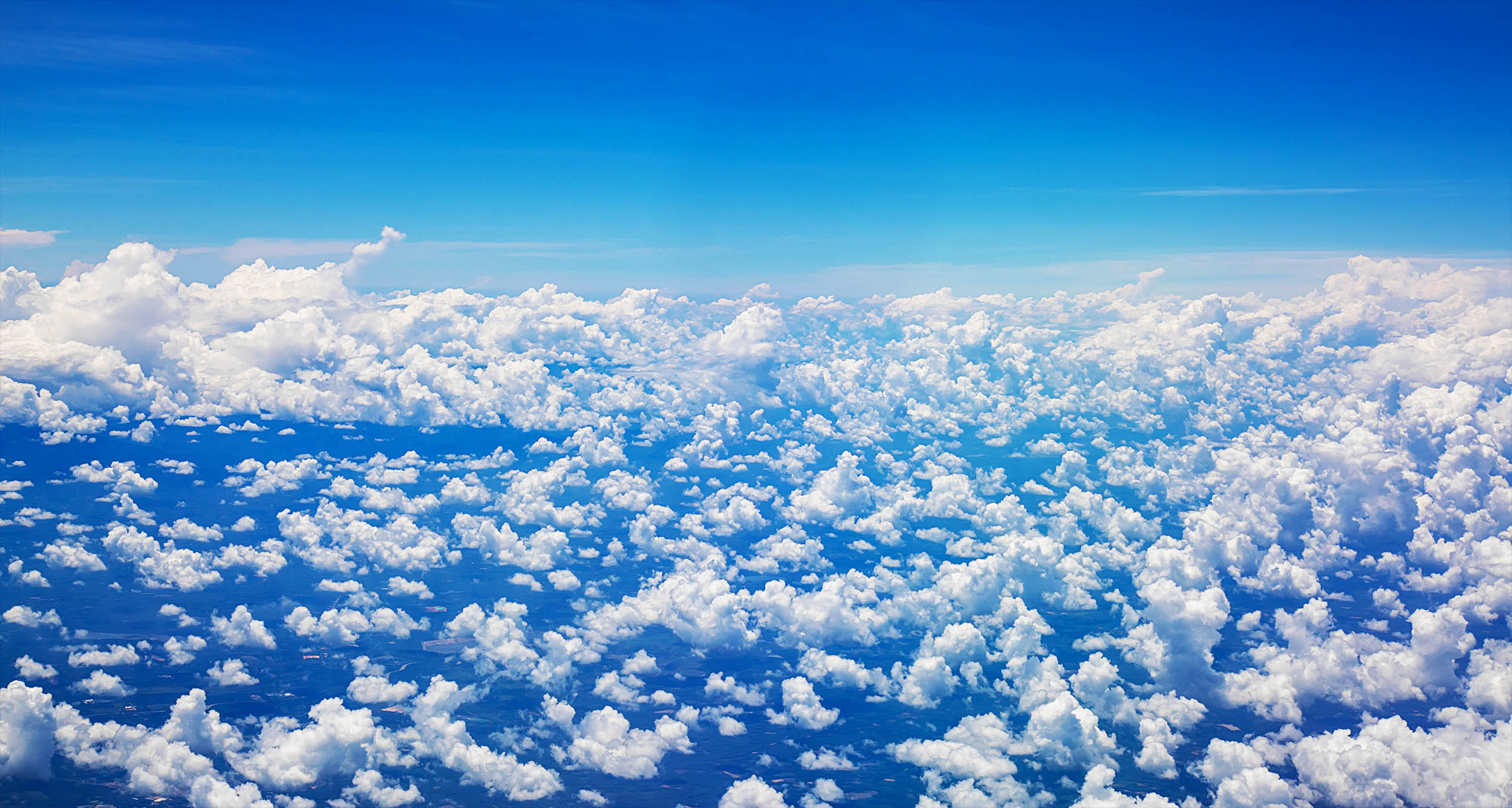 CO2 is cooling the upper atmosphere while warming the planet's surface, and scientists don't know how or why