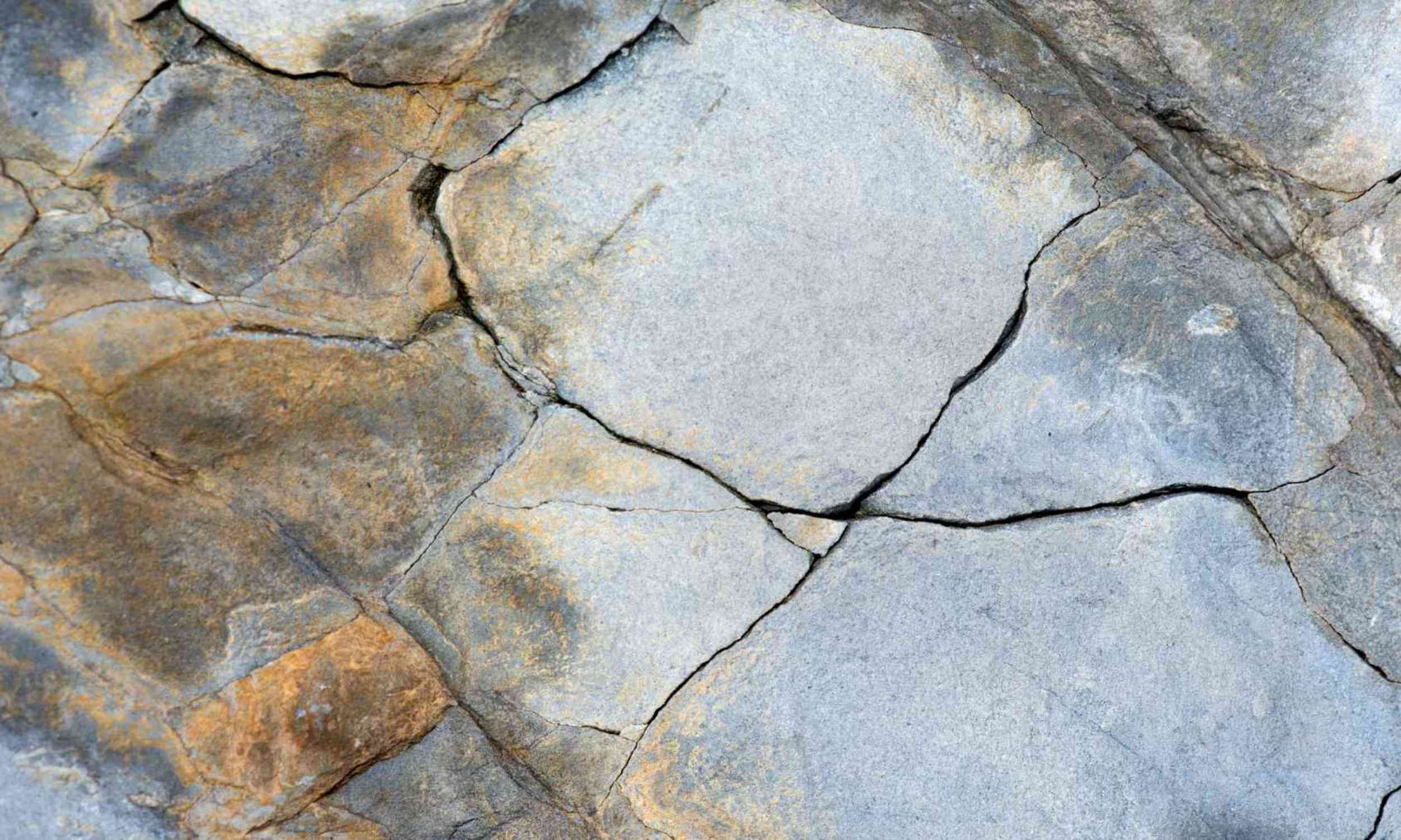 Tiny rock cracks underground are deformed by pressure, changing where water and pollution travel